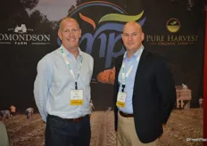 Trey Boyette and Jeff Axelberg with SMP Southeast Marketing, Inc. talk to customers about Mississippi-grown sweet potatoes.